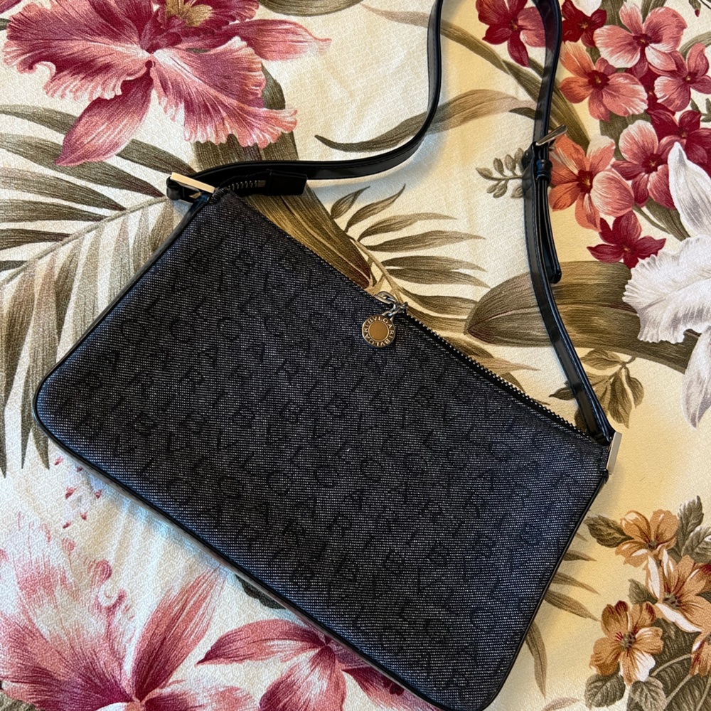 Bulgari Grey mini pouch with handle.